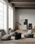 Modern living room with minimalistic furniture and decor.