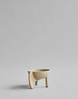 Beige ceramic planter on a light gray background from 101 Copenhagen at Spacio retail stores in Mumbai & Kolkata.