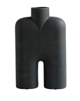 Black abstract vase on a white background from 101 Copenhagen at Spacio retail stores in Mumbai & Kolkata.