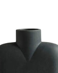 Closeup of Black vase on a white background from 101 Copenhagen at Spacio retail stores in Mumbai & Kolkata.