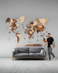 3XL size wooden wall map above a sofa