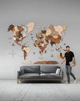 3XL size wooden wall map above a sofa