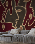 A living room with an Affreschi wall design featuring a red and brown mural from the Affreschi Season 1 Collection.