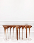 An Agrippa Esgrimas console table with four simple legs.