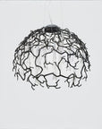 Top view of a dome shaped chandelier hanging on wires with water drops shaped glass suspended from branches in black colour