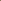 4 Wall lights in different colours discs in different colours in the corner of a room on a beige colour wall.  4 Wall lights in different colours discs in different colours in the corner of a room on a beige colour wall.