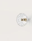 A crystal wall lamp on light beige colour background from Aromas Del Camp available at Spacio retail stores in India.