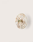 A wall light called WAVE from Aroma Del Campo made of alabaster, available at Spacio retail store in Mumbai & Kolkata.
