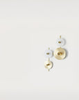 Set of three circular wall lights in gold and white on a light gray background from Aroma Del Campo available at Spacio retail stores in Mumbai & Kolkata