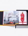 Open book with images of a racing car and a person in a red outfit on a white background