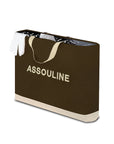 Assouline book with a brown cover and beige edges on a white background