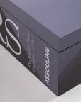 Assouline book with 'RS' and 'The World's Most Exquisite Rides' text on a gray background