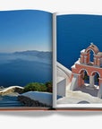 Stunning views of iconic Greek architecture and deep blue sea, from Assouline Greek Islands Luxury Travel Coffee Table Book at Spacio India.