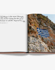 Inspirational Greek quote paired with Greek national pride imagery, featured in Assouline's Greek Islands Coffee Table Book, now at Spacio India.