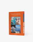 Back cover of Assouline Greek Islands coffee table book featuring iconic Greek island photographs, available at Spacio India retail stores and online.