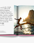 Inspiring page from Ibiza Bohemia book by Assouline depicting playful ocean moments and heartfelt personal quote, presented by Spacio India.