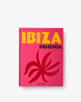 Front view of Ibiza Bohemia book by Assouline, showcasing vibrant pink cover with abstract artwork, offered at Spacio India retail stores.