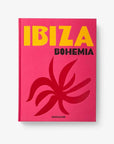 Front view of Ibiza Bohemia book by Assouline, showcasing vibrant pink cover with abstract artwork, offered at Spacio India retail stores.