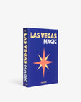 Front cover of the Assouline Coffee Table Book Las Vegas Magic featuring a striking star motif on a deep blue background, available at Spacio India.