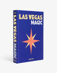 Front cover of the Assouline Coffee Table Book Las Vegas Magic featuring a striking star motif on a deep blue background, available at Spacio India.