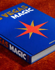 Luxury hardcover edition of Las Vegas Magic by Assouline, placed against a plush red surface, symbolizing the glamour of Vegas, at Spacio India.