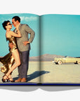 A timeless scene from Las Vegas Magic by Assouline, featuring a glamorous couple against a desert backdrop, available at Spacio India.