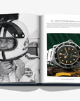 Inside spread of Assouline's Fine Timepieces Coffee Table Book featuring Steve McQueen with a Rolex Submariner, exemplifying iconic luxury watches, available at Spacio India.