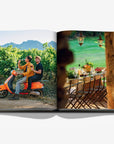 Colourful pictures on a double spread in a luxurious Assouline Wine & Travel France coffee table book featuring France’s finest vineyards and wine regions, available at Spacio India retail stores and online.