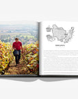 Burgundy map on a double spread in a luxurious Assouline Wine & Travel France coffee table book featuring France’s finest vineyards and wine regions, available at Spacio India retail stores and online.