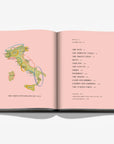 Double spread of the harvesting regions of Italy. A luxurious hardbound Assouline coffee table book, Wine & Travel Italy, featuring Italy’s top vineyards, fine wines, and the art of winemaking.