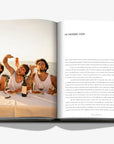 Introduction double spread of A luxurious hardbound Assouline coffee table book, Wine & Travel Italy, featuring Italy’s top vineyards, fine wines, and the art of winemaking.