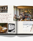 Photograph on a double spread of a luxurious hardbound Assouline coffee table book, Wine & Travel Italy, featuring Italy’s top vineyards, fine wines, and the art of winemaking.
