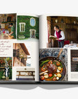 Colourful photographs on a double spread of a luxurious hardbound Assouline coffee table book, Wine & Travel Italy, featuring Italy’s top vineyards, fine wines, and the art of winemaking.