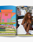 Vibrant Miami Beach lifeguard tower with a bright pink and orange design, set against a clear blue sky. Featured in the Assouline Coffee Table Book Miami Beach, available at Spacio