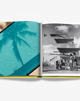 Vintage Miami Beach Diving Photography – A black and white historical image of a high diving board in Miami, featured in Assouline’s Miami Beach coffee table book. Now at Spacio India.