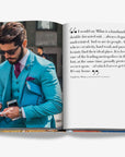 Double spread of a stylish man in a turquoise suit taking notes while holding a phone and a blue leather bag, with a quote about Milan’s elegance and creativity in a luxurious Assouline Milan Chic coffee table book, showcasing Milan’s timeless elegance, now available at Spacio India’s online store and retail outlets.