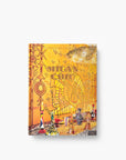 On a white background an artistic cover featuring a vibrant mural and eclectic glassware, reflecting Milan’s rich design heritage in luxurious Assouline Milan Chic coffee table book, showcasing Milan’s timeless elegance, now available at Spacio India’s online store and retail outlets.