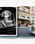 Luxury featuring a black-and-white portrait of an elegant woman in a car and a stunning shot of the iconic Hotel de Paris with a classic Rolls-Royce in double spread page of a luxurious Assouline's Monte Carlo coffee table book, featuring a vibrant cover with images of Monaco's iconic landmarks, available at Spacio India.