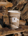 Hand-blown Baobab Sand Siloli Candle Max 24 - An artistic luxury candle with layered beige and brown hues, inspired by desert landscapes, at Spacio India.