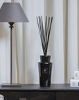 Baobab Encre De Chine Diffuser, a sophisticated home fragrance with deep leather and amber notes, elegantly styled in a luxury interior setting, available at Spacio India.