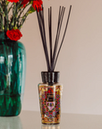 Baobab Mexico Diffuser with a gourmet scent of blackcurrant, freesia, and cedar, styled with vibrant floral decor, available at Spacio India.