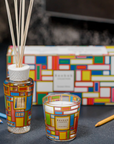 Baobab Ocean Drive home fragrance collection with mandarin and cedar scent, presented in a vibrant geometric design inspired by Ocean Drive, available at Spacio India.