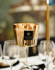 Baobab Aurum Candle Max 10 placed on glass stem - elegant dinner decor and scent available at Spacio India
