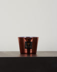 Stylish Baobab Stones Lazuli Candle Max 10 placed on a grey surface, perfect for luxury interiors, available at Spacio India.