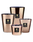 Baobab Cyprium Candle set in shiny bronze hues with elegant labelling, statement fragrance collection by Baobab at Spacio India.