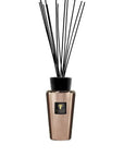 Baobab Cyprium Diffuser 500ml with black diffuser sticks in an elegant metallic copper glass bottle by Baobab Collection, available at Spacio India.