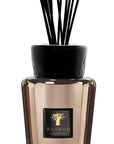 Close-up of Baobab Cyprium Diffuser 500ml showing the luxurious copper-tinted glass and embossed black stopper, a premium home fragrance diffuser by Baobab Collection at Spacio India.
