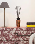 Baobab Cyprium Diffuser 500ml on a designer chest of drawers alongside modern table lamp and luxury books, perfectly complementing sophisticated home interiors; exclusively at Spacio India.