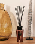 Baobab Cyprium Diffuser 500ml showcased next to artistic decor elements and sculptures, adding refined elegance and fragrance to luxury spaces, offered by Baobab Collection at Spacio India.