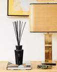 Baobab Encre De Chine Diffuser, a luxury home fragrance combining leather and amber notes, displayed in a refined space, available at Spacio India.
